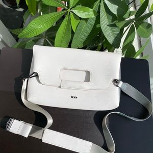 TUMI clutch , white leather , removable shoulder strap, convertible